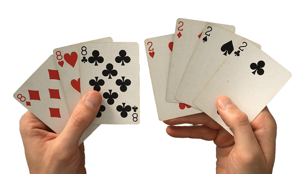Close-up view of two decks of cards spread out on a wooden table