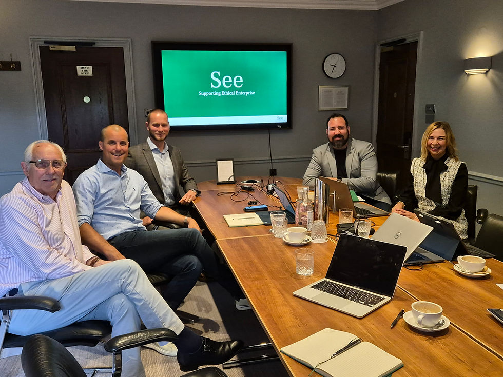 Members of the See Limited team taking part in internal discussions to reduce carbon emissions