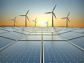 Wind turbines and solar panels work to capture energy