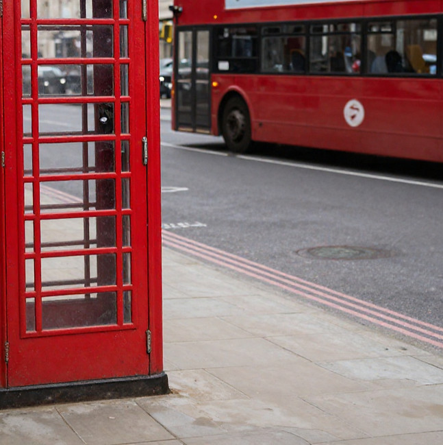 freepik__uk-street-setup-with-red-telephone-box-doubledecke__7555_edited.jpg