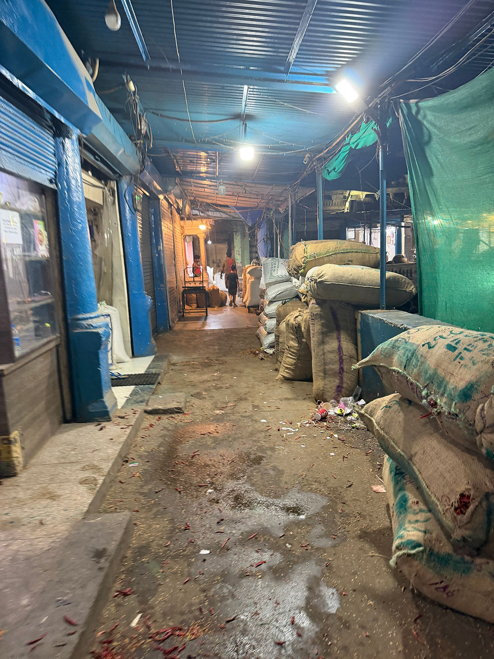 Large bags of spices lining the second floor.