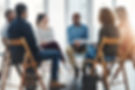 A group therapy session with diverse people sharing their sad problems and stories. People