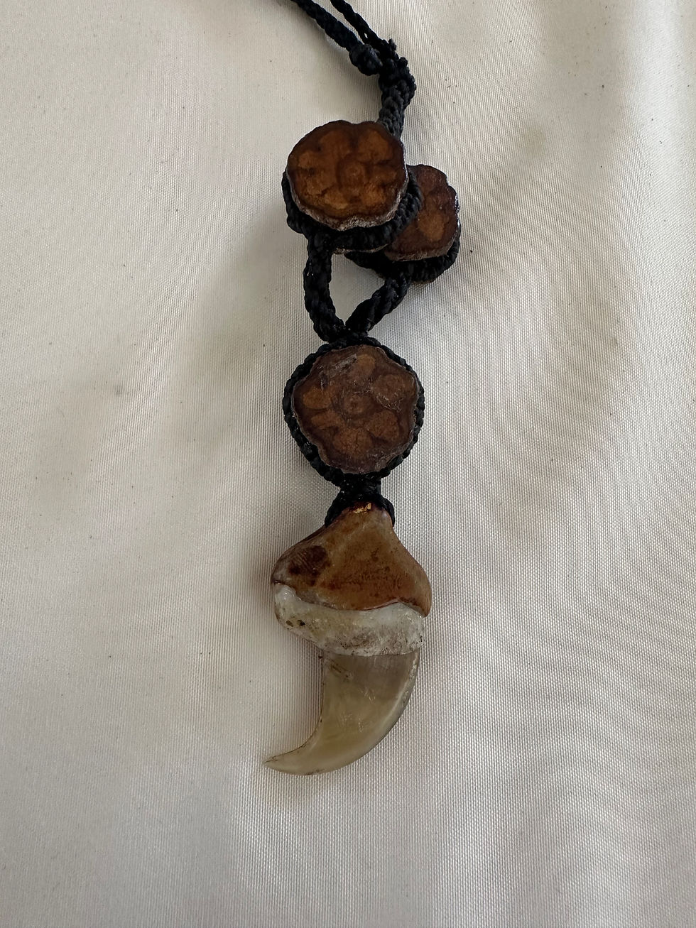 Thumbnail: Jaguar nail necklace
