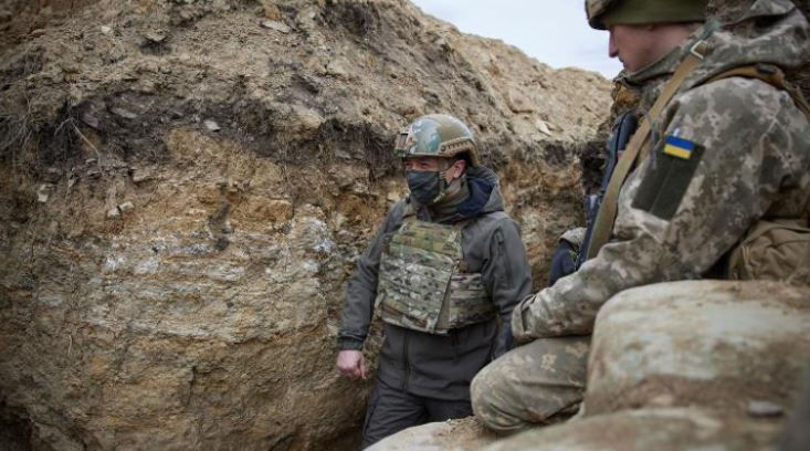 Ukraine's President heads to the trenches as Russia masses its troops