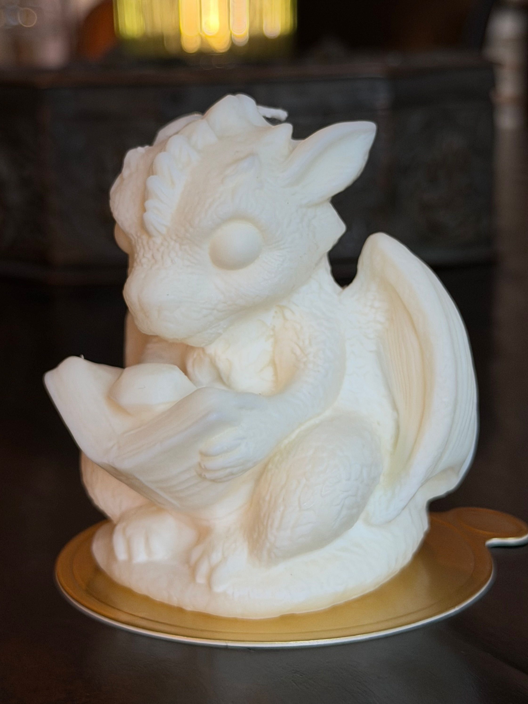 Baby Dragon Reading a Book Candle - Ivory - Unscented