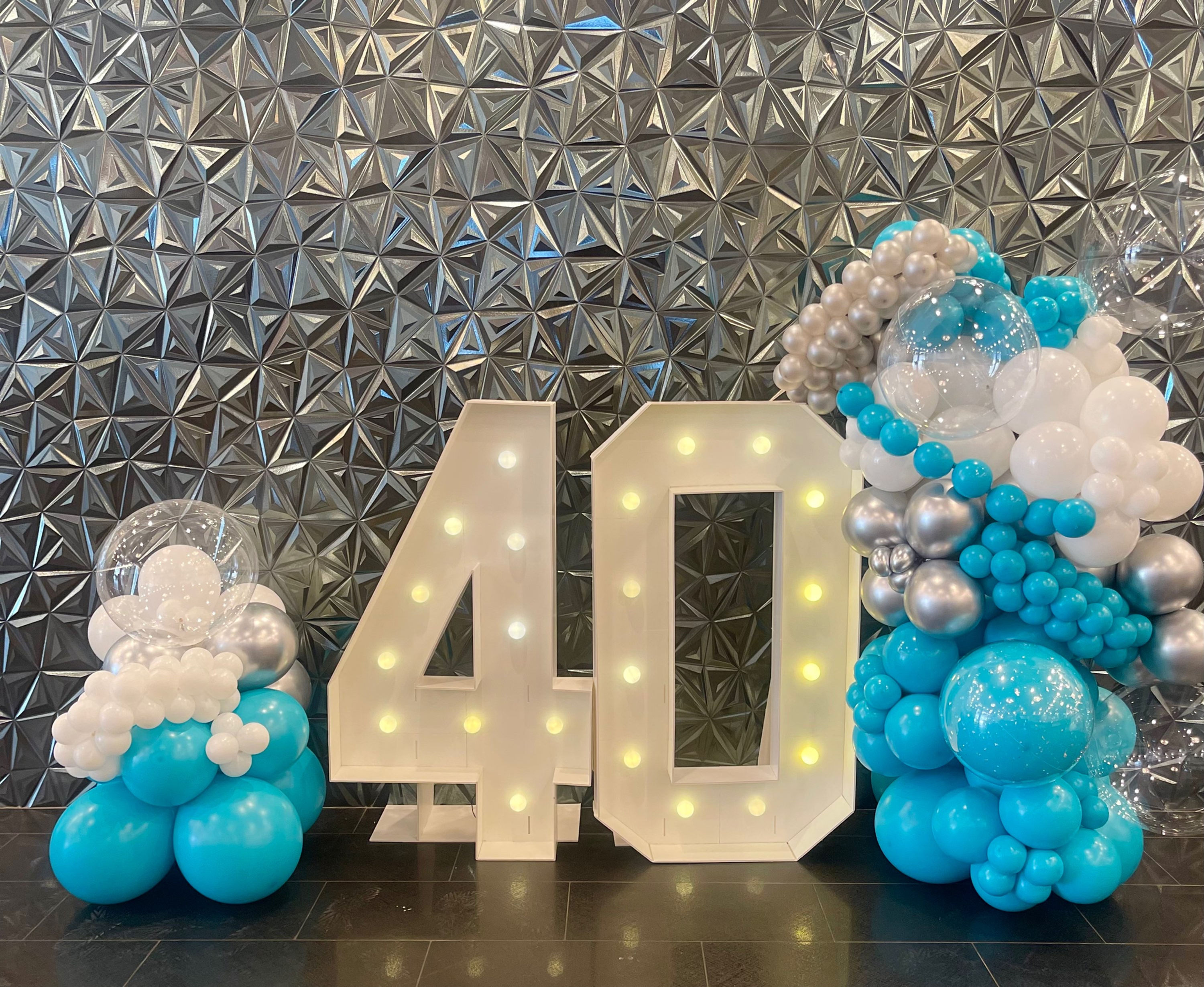 2  Number marquee with lights and balloon garland 