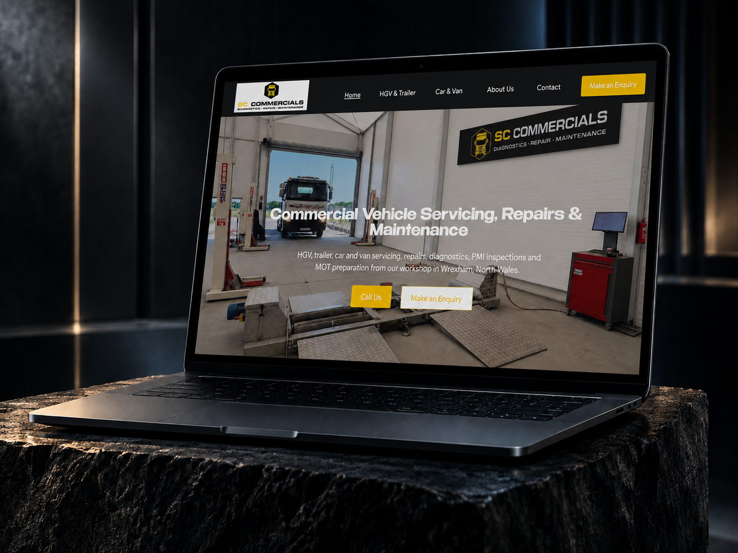 SC Commercials website displayed on a laptop