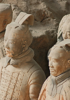 a group of statues of men standing next to each other_edited.jpg