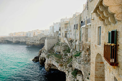 a view of the ocean from a cliff side_ed