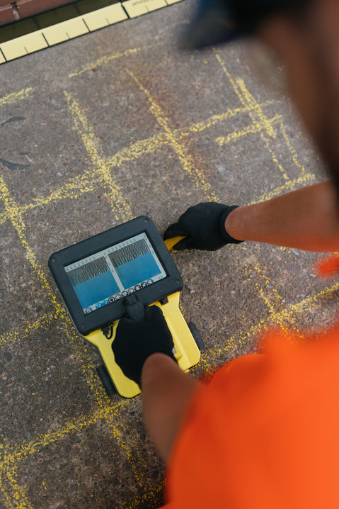 Hilti PS1000 rebar detector scanning concrete slab to locate 16mm rebars at 120mm depth.