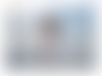 Man and Woman kissing on Indian Rocks Beach on a windy night at blue hour.