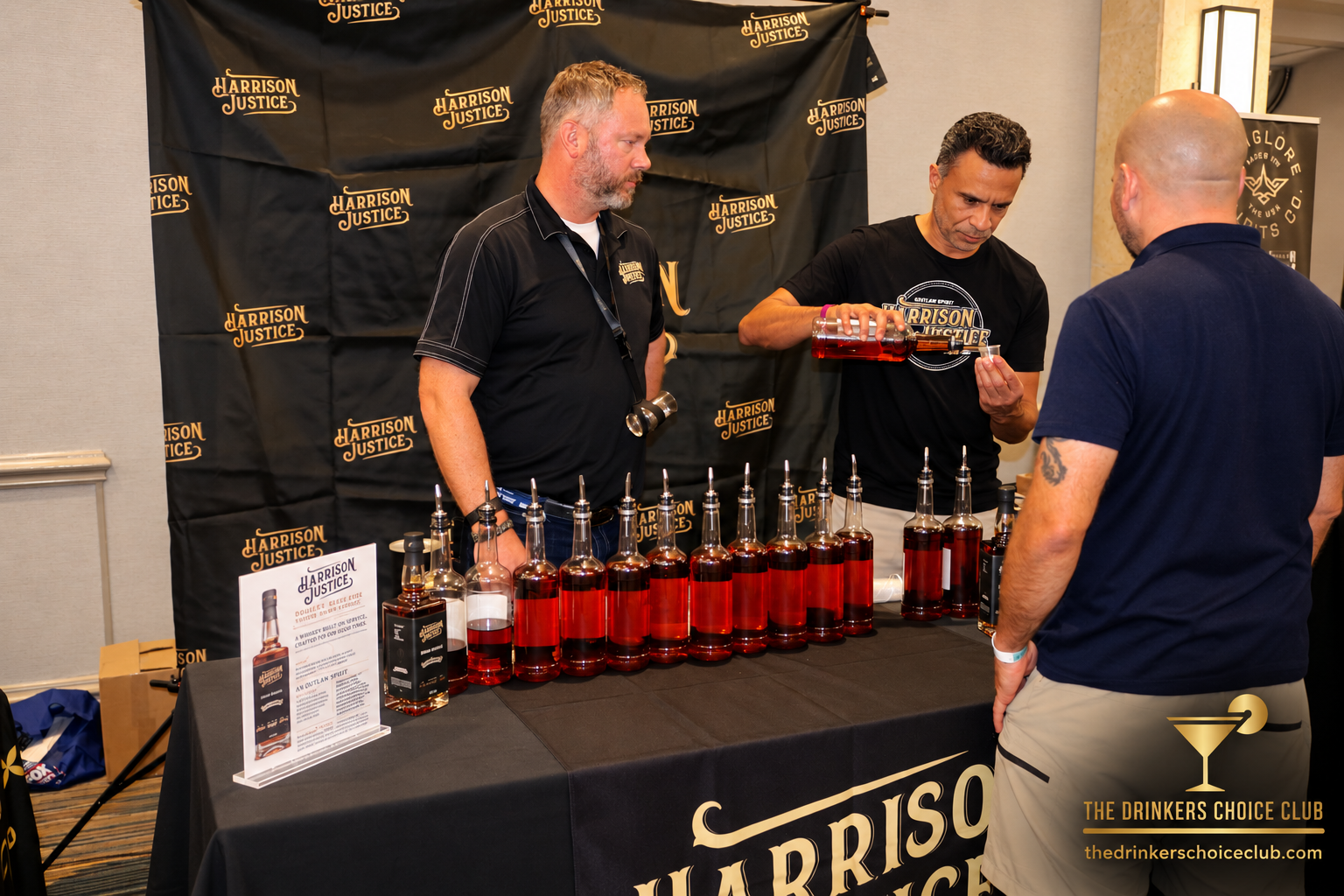 Harrison Justice Whiskey Co. presenting its whiskey to a guest at C.R.A.F.T. Frontline Tastings in Tampa.