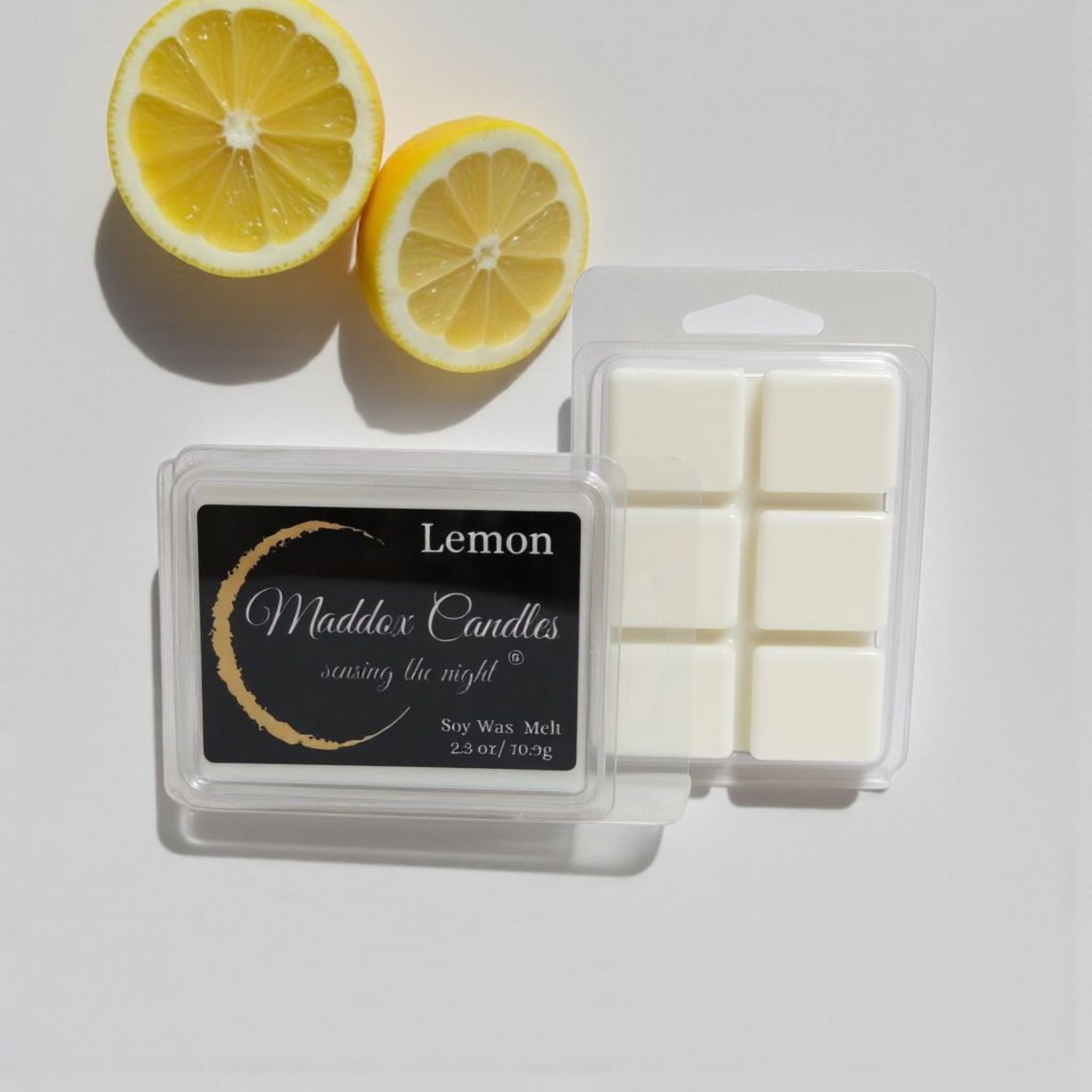Lemon wax melts with lemon halves, Maddox Candles, morning to night.