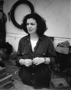 Mona Hatoum portrait standing in studio, black & white