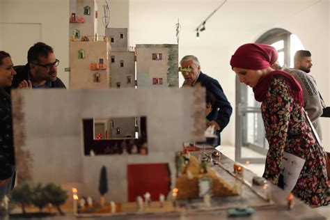 Mixed media installation by Wafa Hourani, showing miniature city‑scape “Qalandia 2067”