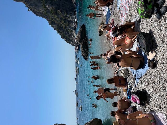 Public beach at Capri  by sirens rock