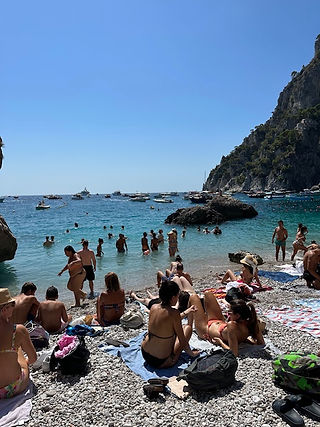 Public beach at Capri  by sirens rock
