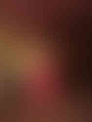 Standing by the Vats used for fermentation