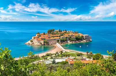 Sveti Stefan island in Budva in a beautiful summer day, Montenegro.jpg