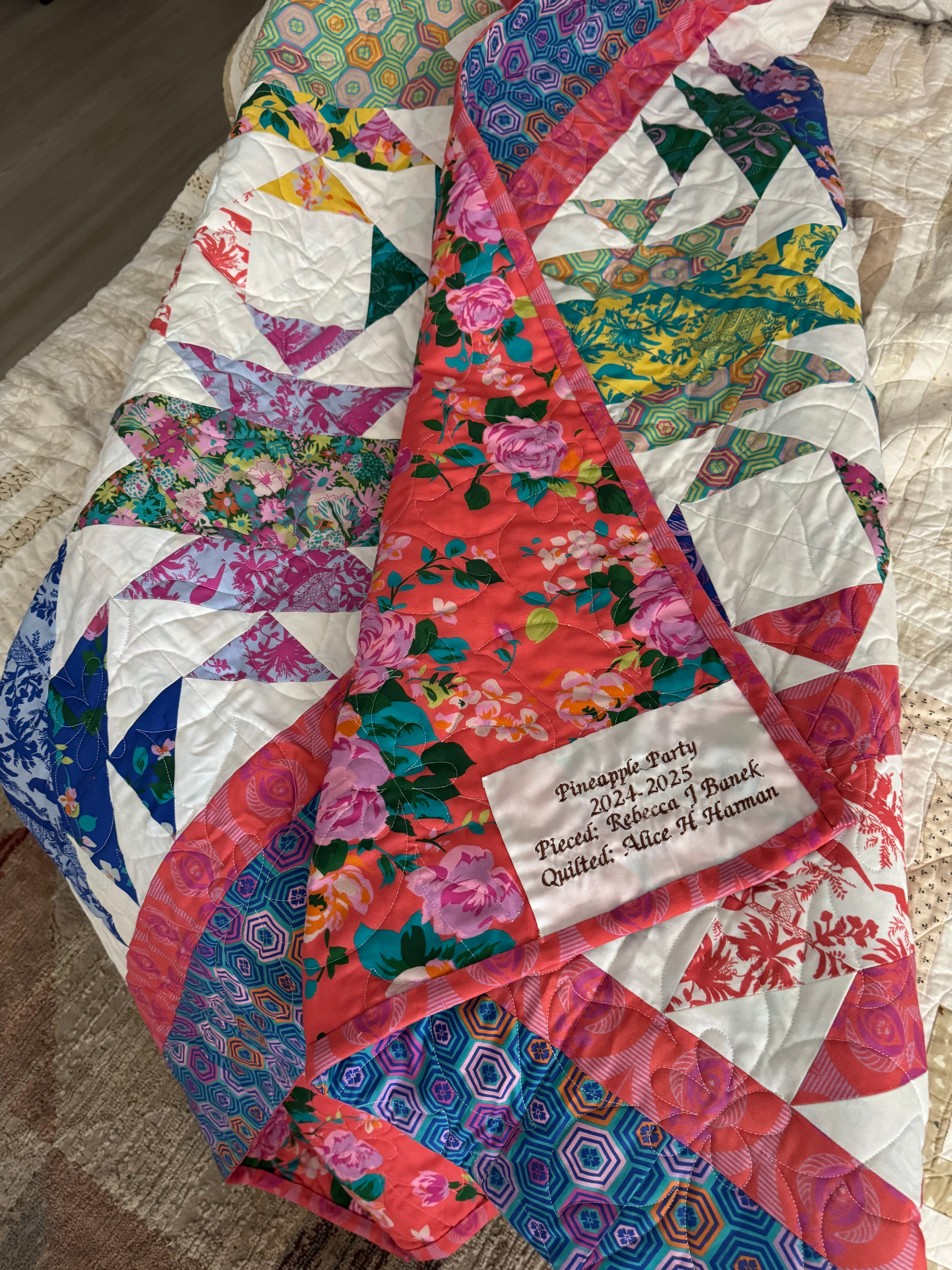 Bright flower themed Quilt for Sale using Pattern: "Pineapple party" designed by Lisa Swenson Ruble with RB Studios Co
Top Fabric: Lovely Days fabric collection by Jennifer Paganelli
Backing: Lovely Days fabric collection by Jennifer Paganelli