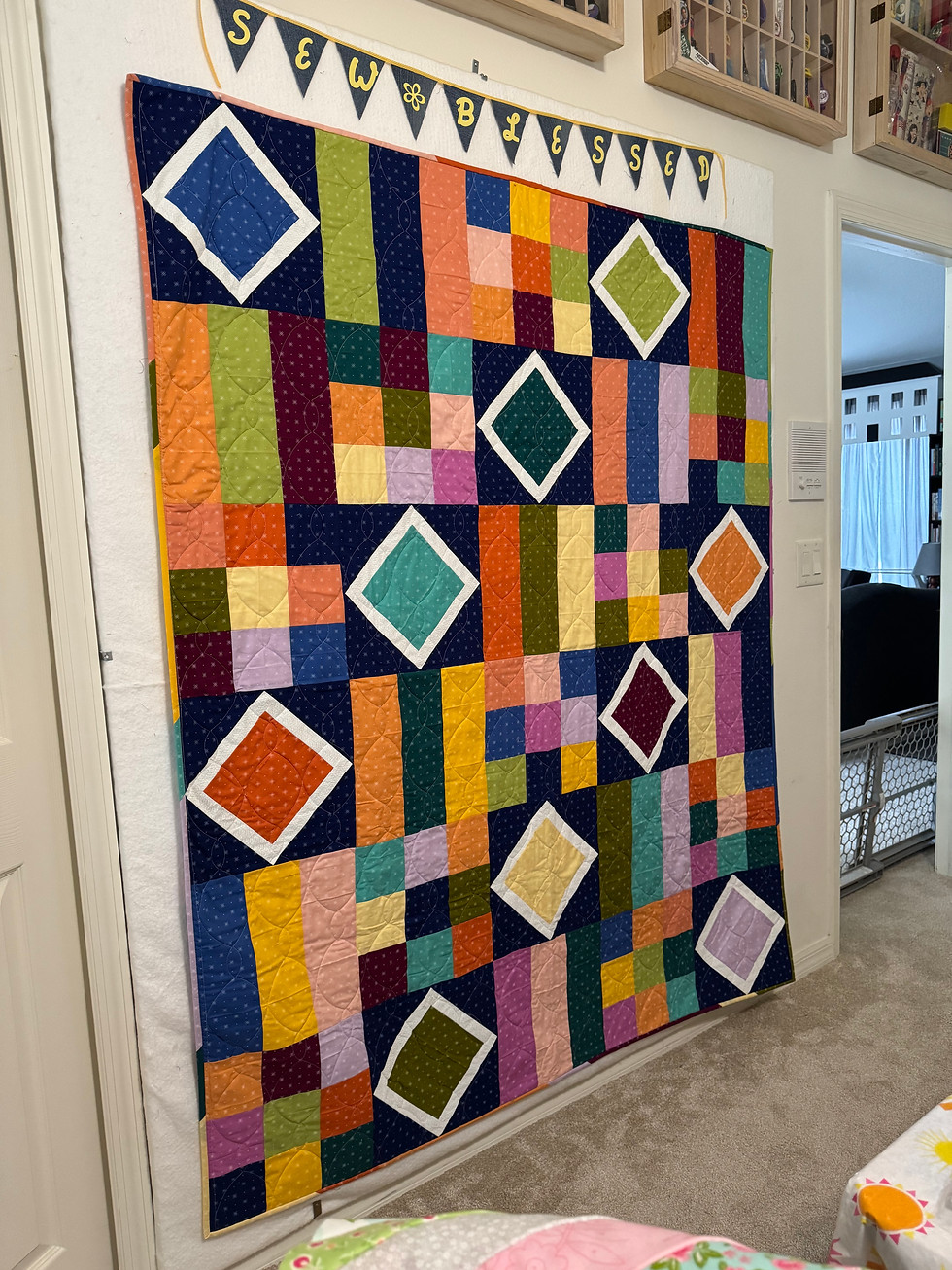 Bright vibrant patchwork Quilt for Sale using Pattern: "Freeze Frame" by Linda & Carl Sullivan
Top Fabric: Beyond Bella Moda Fabric Collection