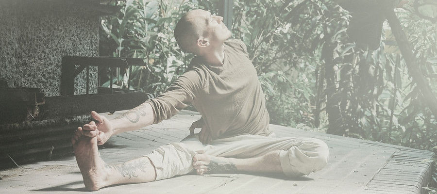 cannabis man stretch yoga deck cropped haze.jpg