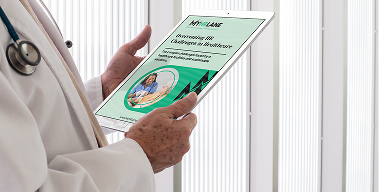 Doctor views tablet: "Overcoming HR Challenges in Healthcare" by PAYLANE.