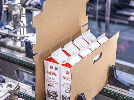 milk carton packed to corrugated cardboard box with wrap-around packaging machine