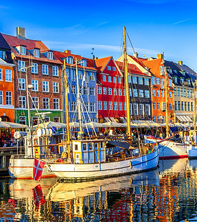 Copenhagen, Denmark_ Old Nyhavn harbour with ships and colorful buildings, Old Town, Europ