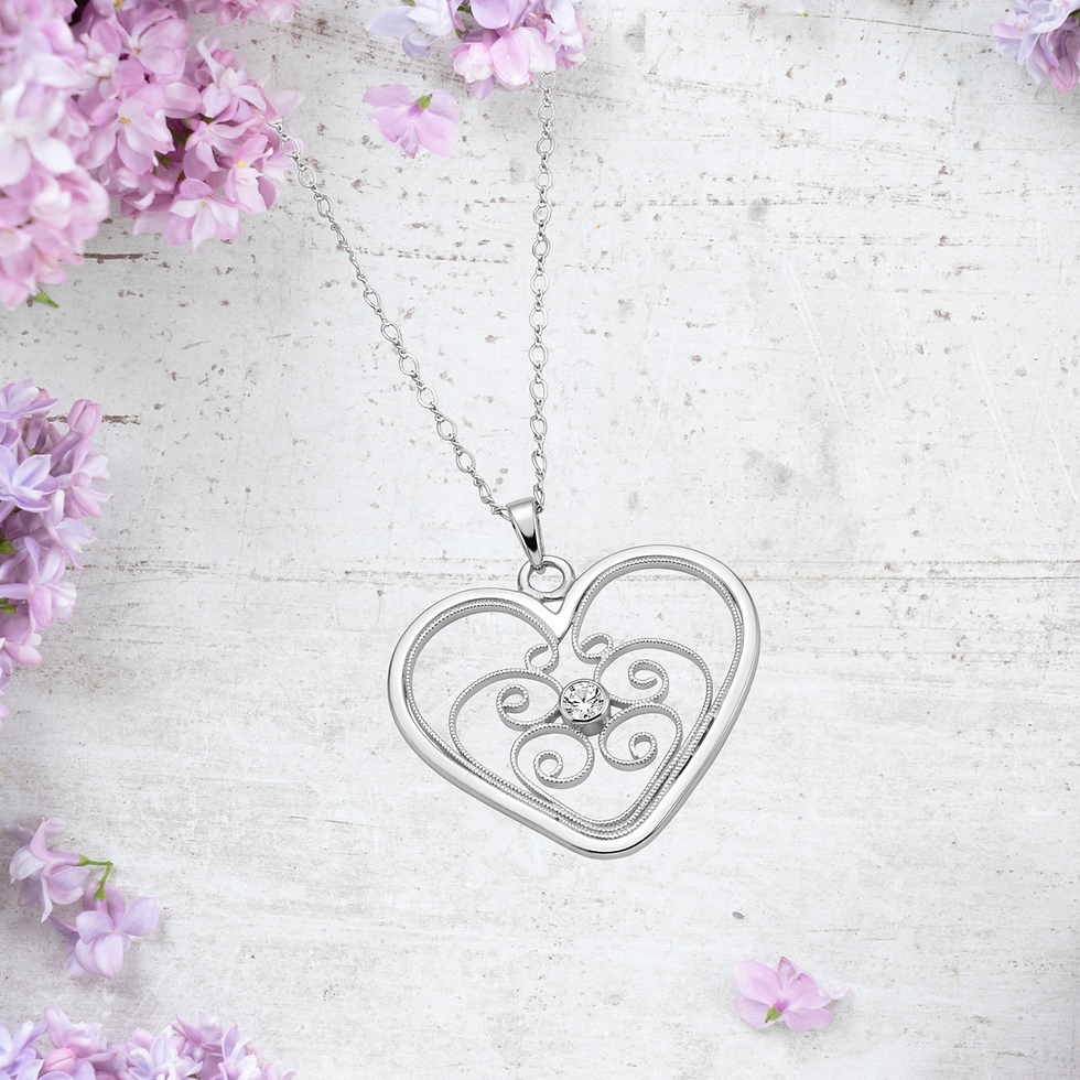 Silver filigree heart pendant