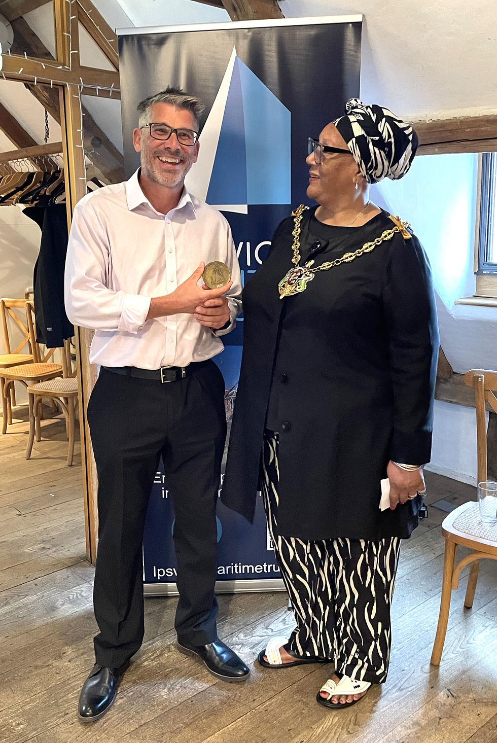 Dale Banham, this year’s recipient of the IMT’s Richard Smith Memorial Award, receiving his bronze medal from the Mayor of Ipswich, Councillor Pat Bruce-Browne.