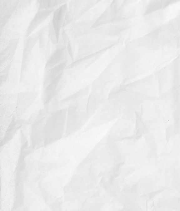 white textile on brown wooden table_edited.jpg
