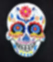 An acrylic painting of a candy skull.