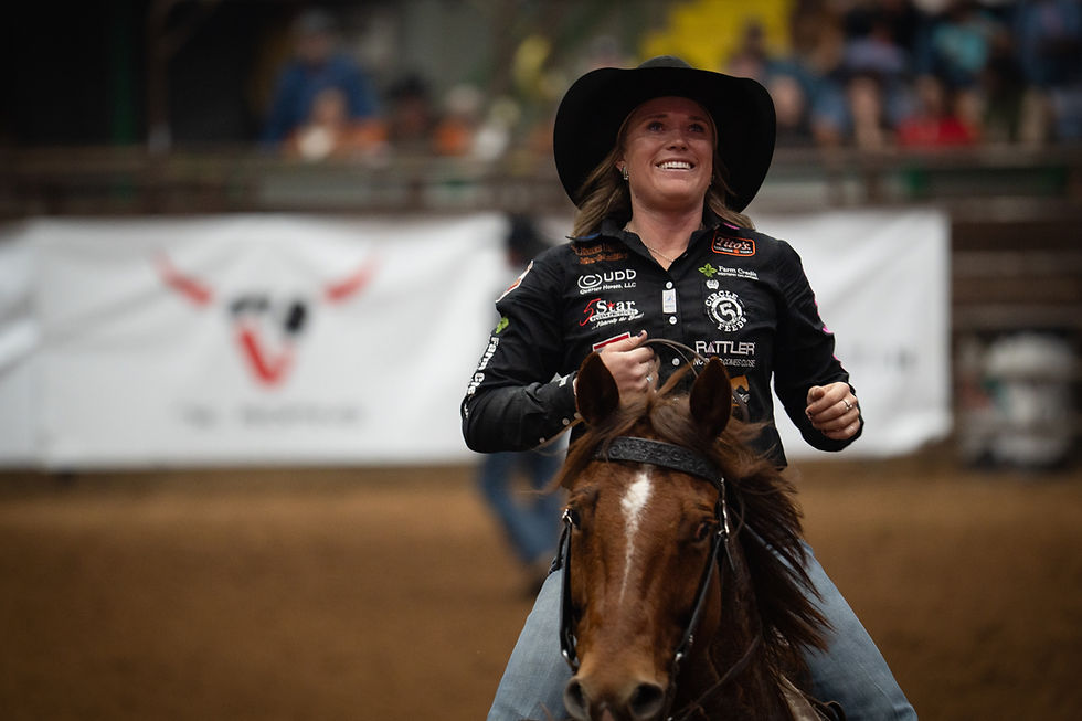 Musell riding out of the arena after her 2.0 sec run knowing she just won the world championship title.