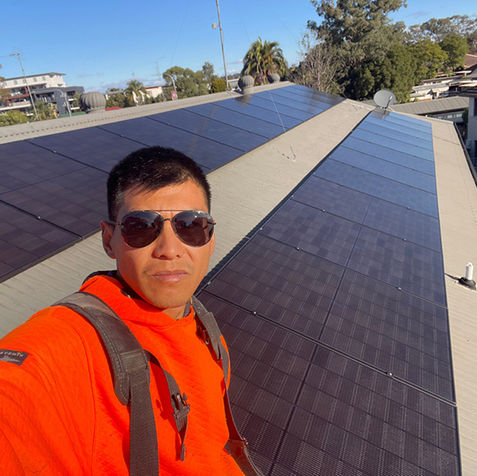 Picture of a Worker With Solar Sytem
