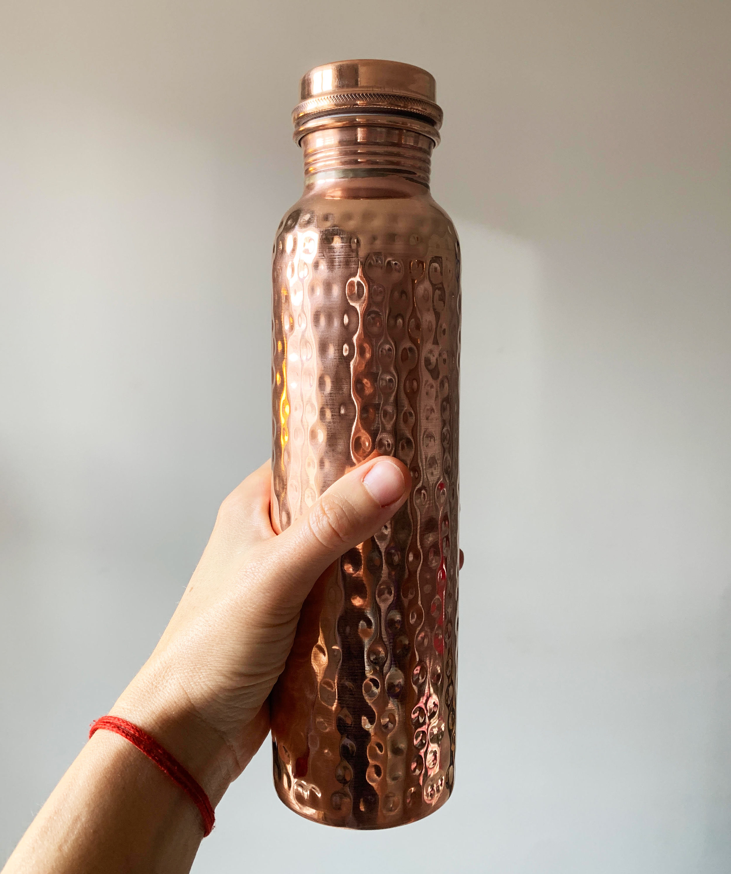 bouteille en cuivre martelé