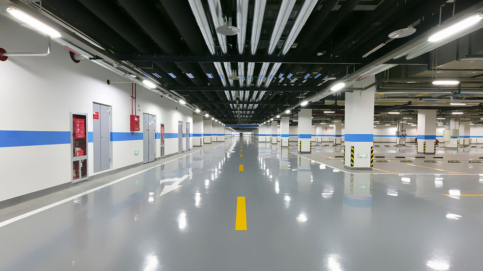 Reflective johorepoxy floor in a large, empty hall