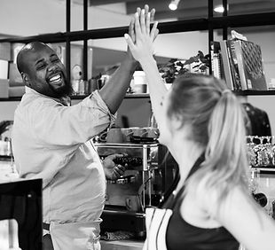 colleagues-give-high-five-each-other.jpg