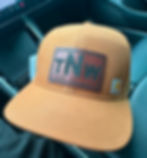 Laser-engraved leather hat patch for Team No Walk Hunting Club crafted by Georgia Stitch and Print