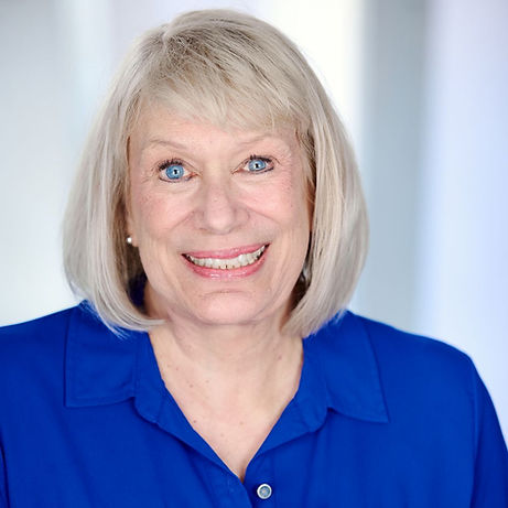Jann Vann Dyke in a blue shirt