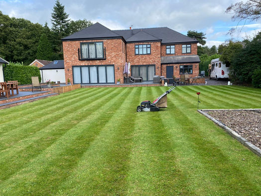 Lawn mowing a large domestic garden