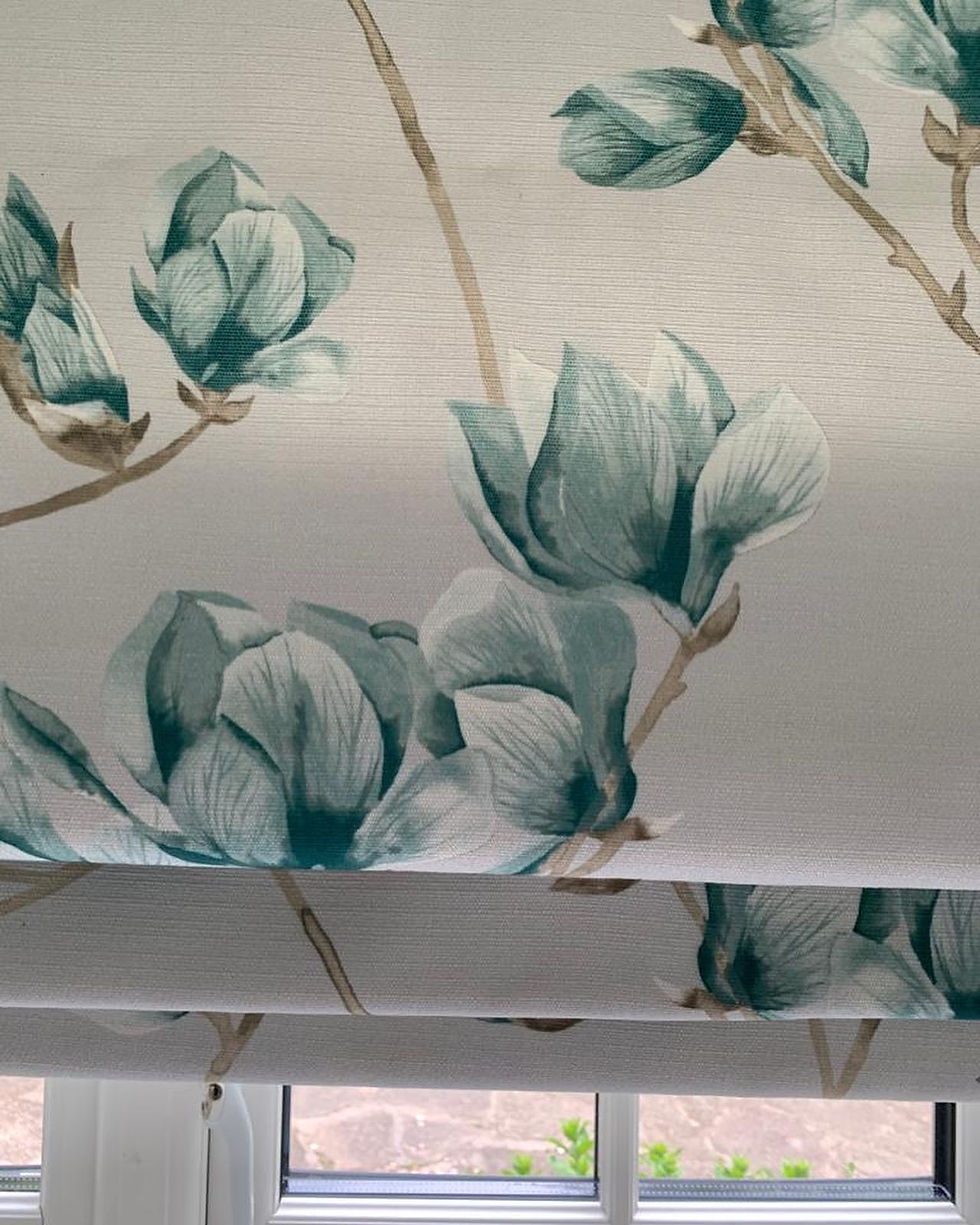 Roman blinds made in a bespoke flowery fabric