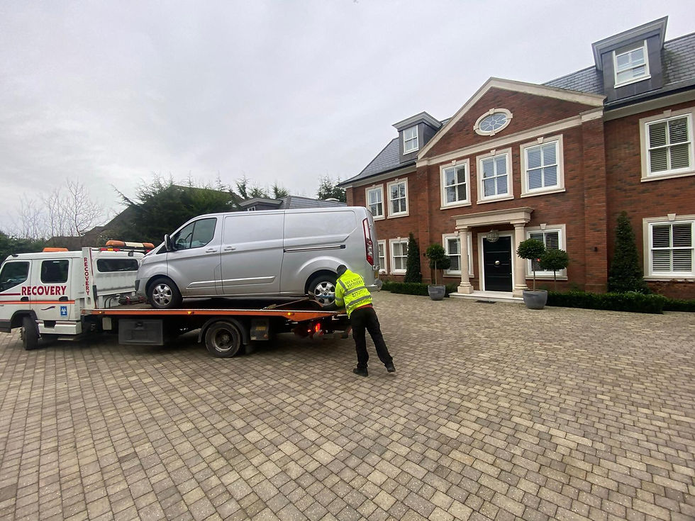 A van being prepared for transport