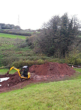 a soakaway being installed