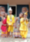 Children dressed in traditional attire for a school event.