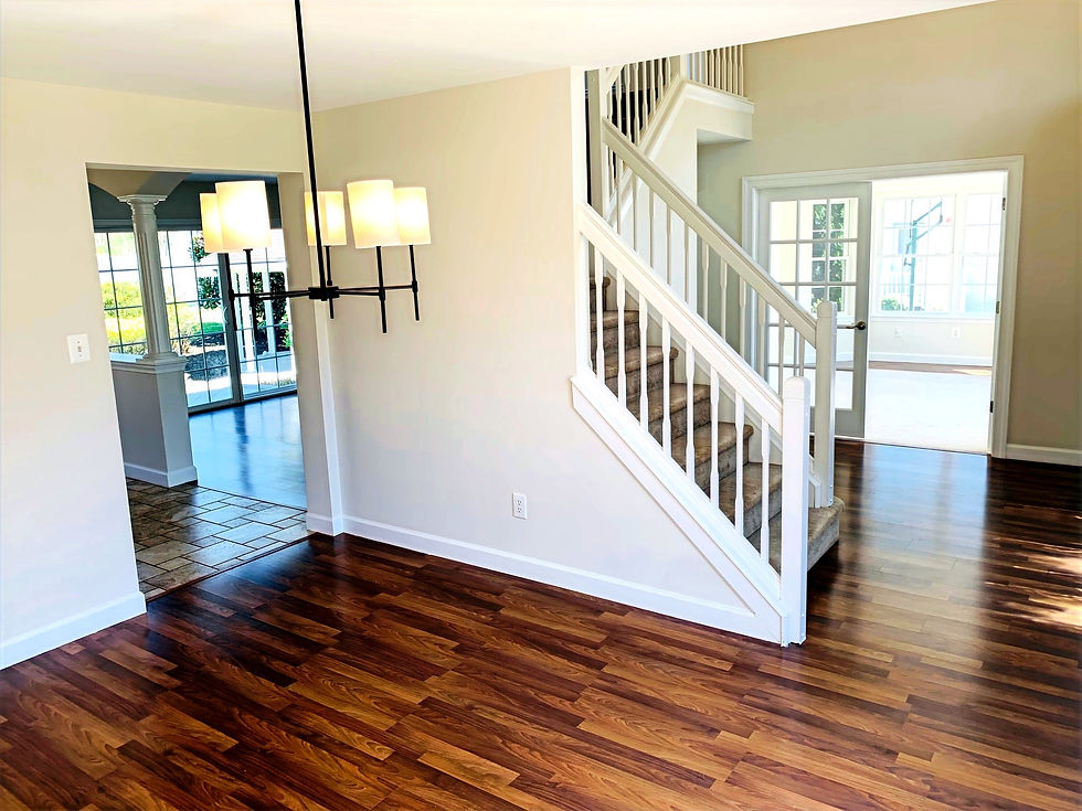 DINING ROOM VIEW TO FOYER/ KITCHEN/ FAMI