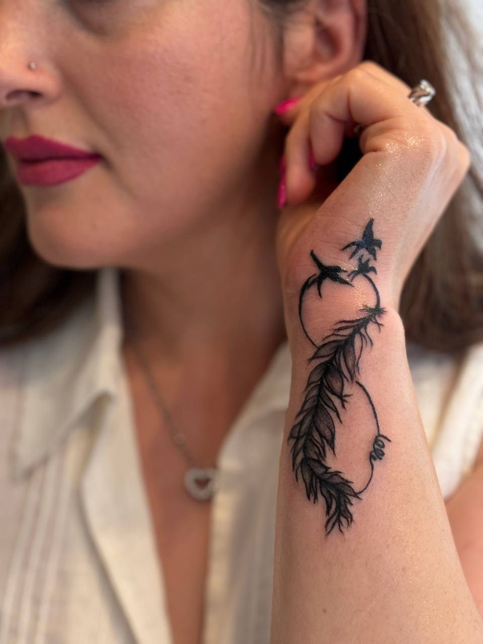 wrist tattoo star feather maple ridge ink bunker raha