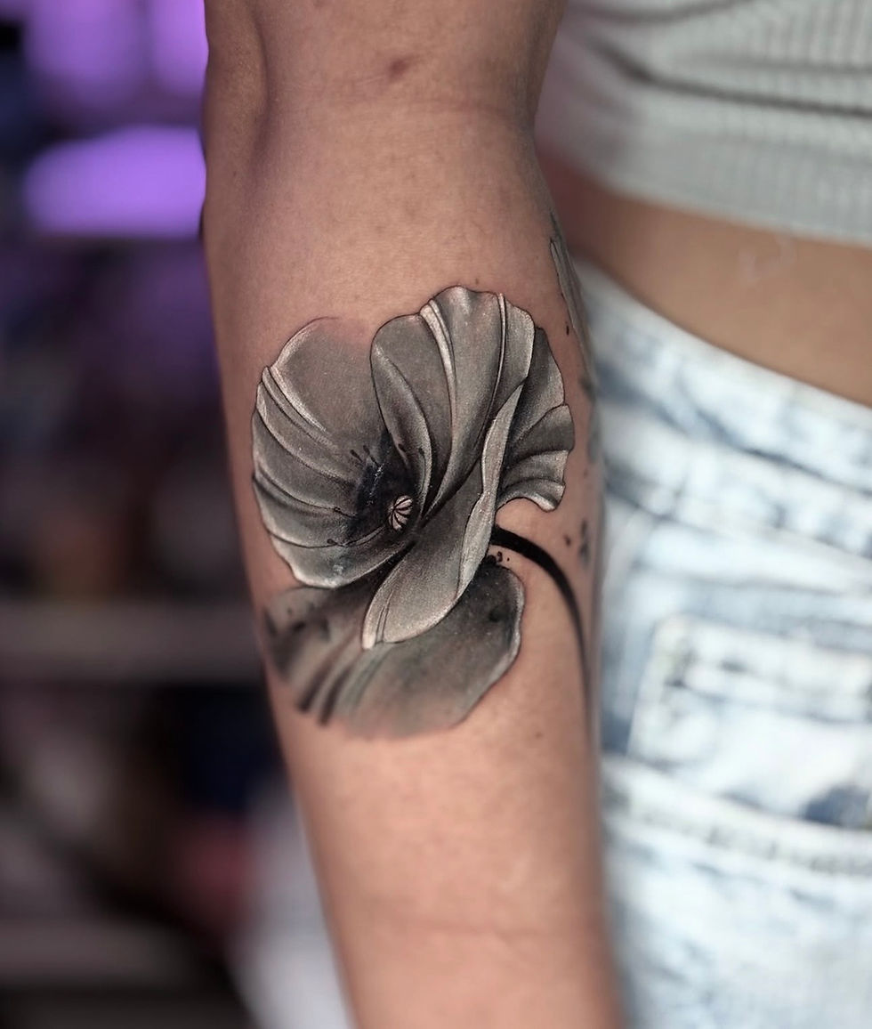 black and white flower on arm ink bunker raha