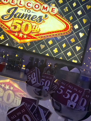 Casino-themed 50th birthday welcome display and party favors