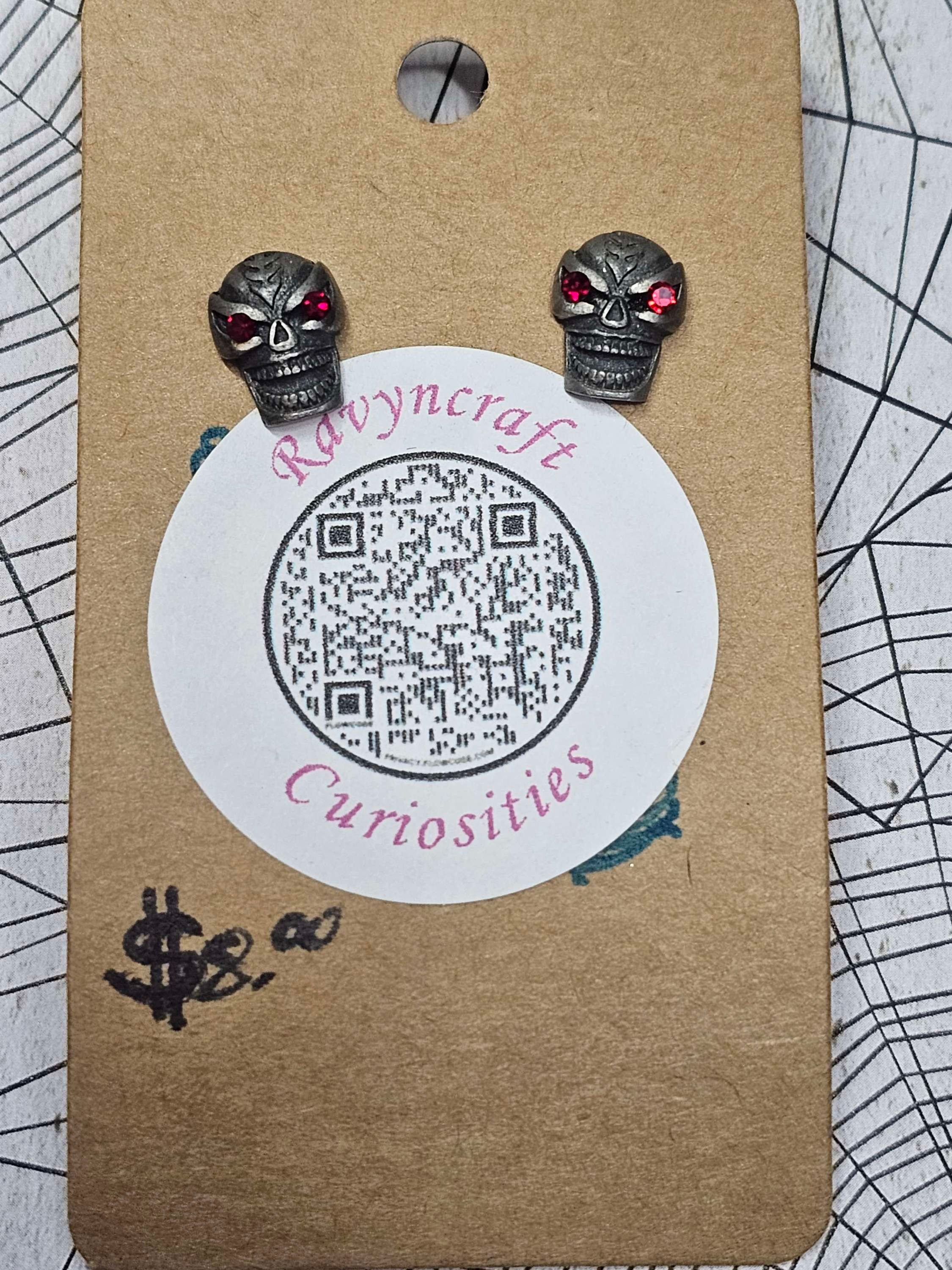 Red Eyed Metal Skull Stud Earrings